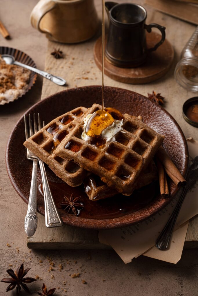 Pumpkin spice waffles with melted butter & a maple syrup drizzle